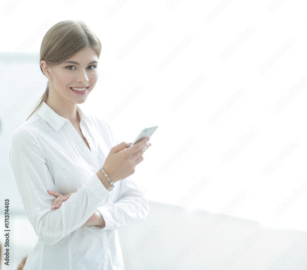 Closeup portrait young business woman, looking at cell phone Closeup portrait young business woman, looking at cell phone
