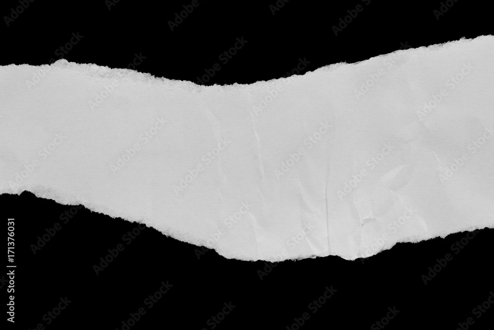 Ripped paper on black background, space for advertising copy. Ripped paper on black background, space for advertising copy.