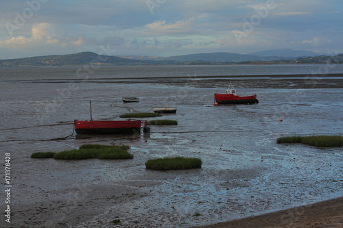 Stranded boats in Morecambe Bay at low tide