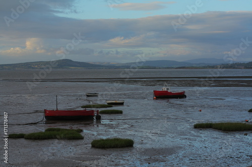 Stranded boats in Morecambe Bay at low tide