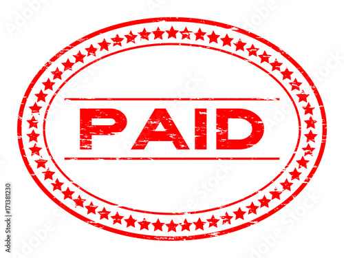 Grunge red paid oval rubber seal stamp on white background