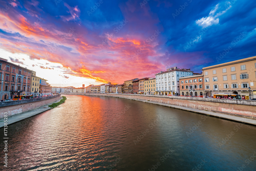 scenic sunset on river in Pisa