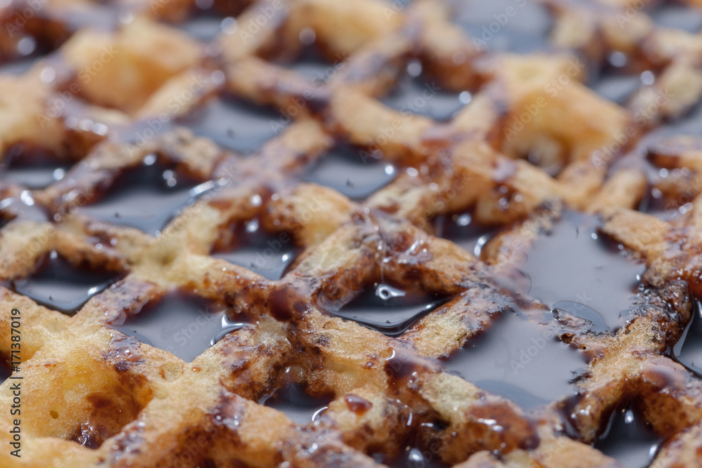 abstract texture of waffle with melted chocolate abstract texture of waffle with melted chocolate