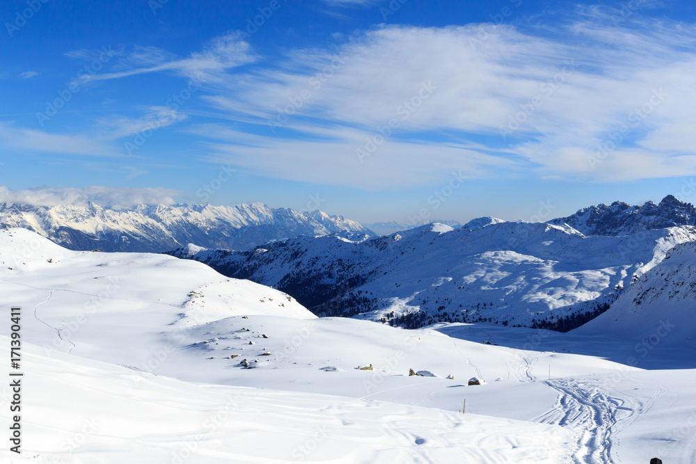 Mountain panorama with snow and ski tracks in winter in Stubai Alps, Austria Mountain panorama with snow and ski tracks in winter in Stubai Alps, Austria