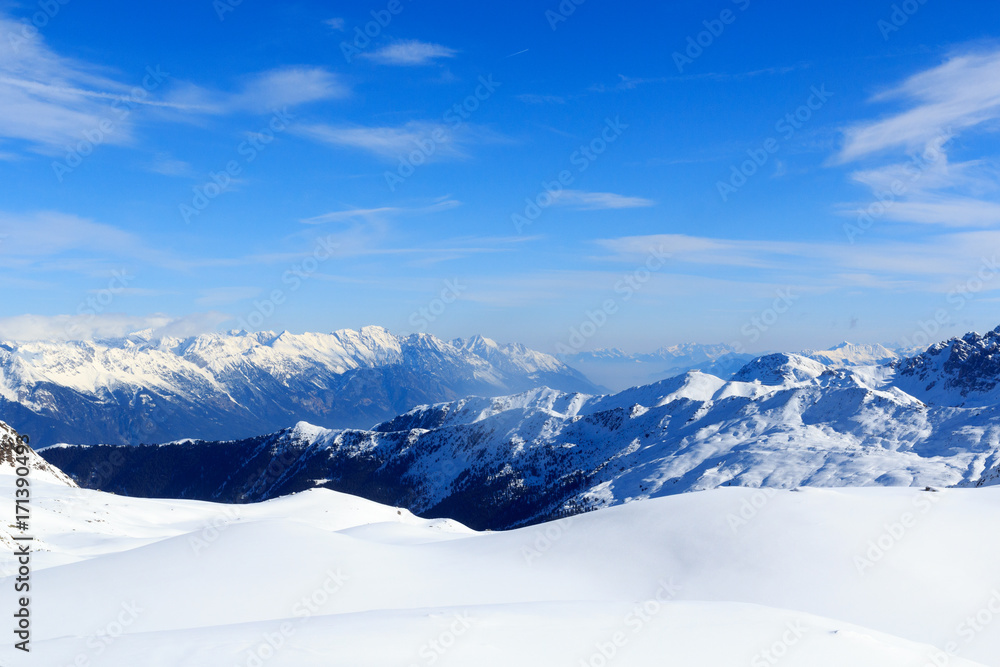 Obraz premium Mountain panorama with snow and blue sky in winter in Stubai Alps, Austria