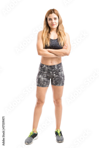 Strong woman in sporty outfit
