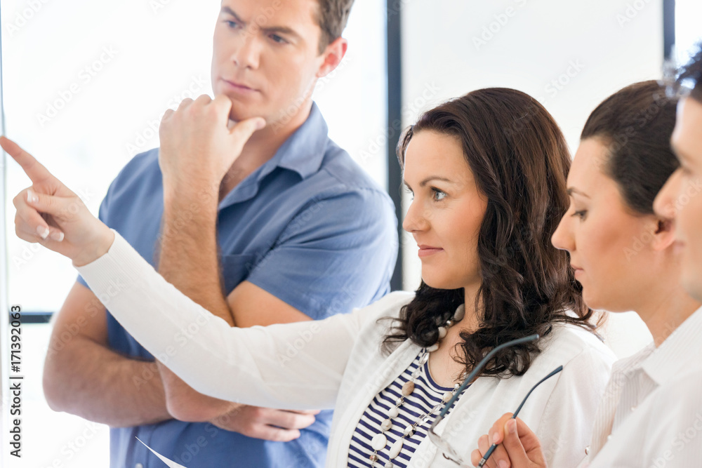 Fototapeta premium Image of business partners discussing documents and ideas