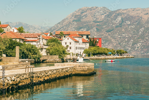 Fototapeta Naklejka Na Ścianę i Meble -  View of the embankment in Prcanj in Kotor Bay, Montenegro.