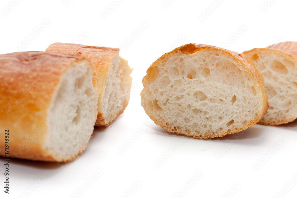 a slice of french bread isolated on white background a slice of french bread isolated on white background