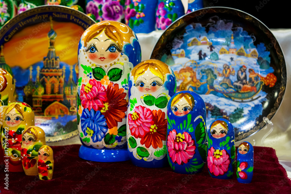 colored matrioskas at the russian shop