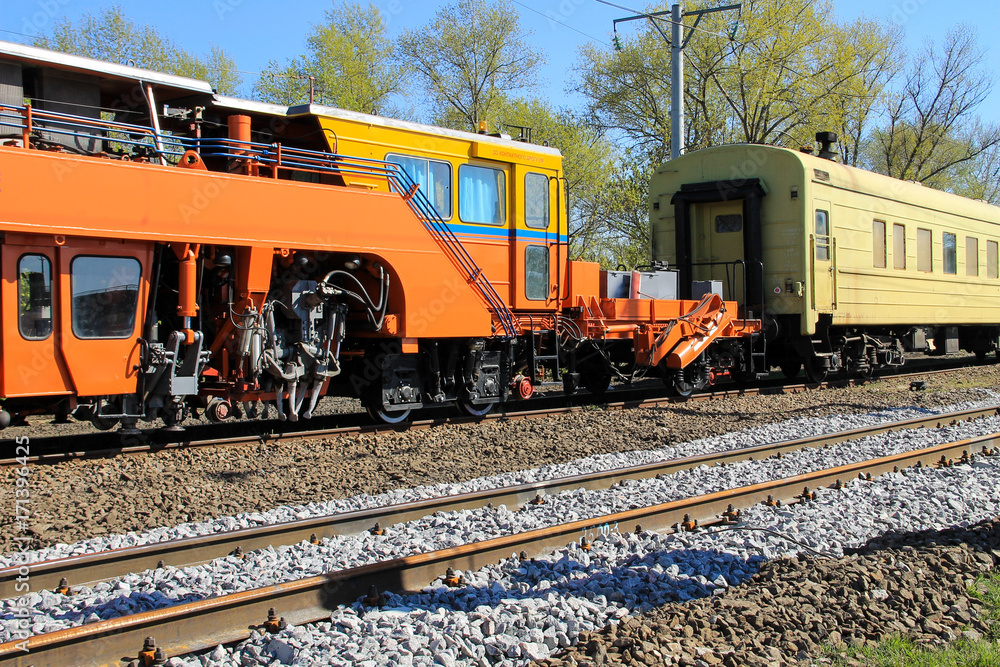 Fototapeta premium View on the maintenance train on railroad track