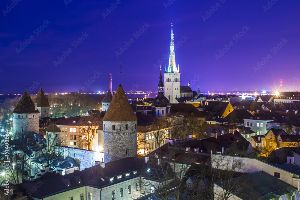 Aerial view of the Old City of Tallinn at sunset from a viewpoint in Toompea Hill on a beautiful winter night. A World Heritage Site since 1997.
