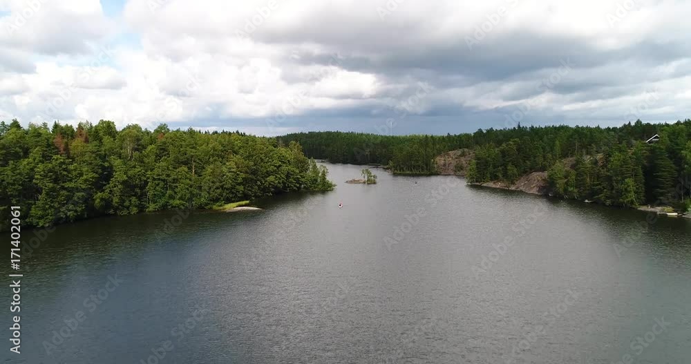 Rowboats in narrows Cinema 4k aerial view over two boats of fishermen rowing on a lake, on a cloudy day, in Uusimaa, Finland Rowboats in narrows Cinema 4k aerial view over two boats of fishermen rowing on a lake, on a cloudy day, in Uusimaa, Finland