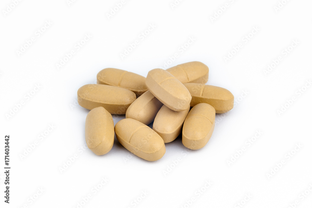pills stacked isolated on white. Healthcare background. pills stacked isolated on white. Healthcare background.
