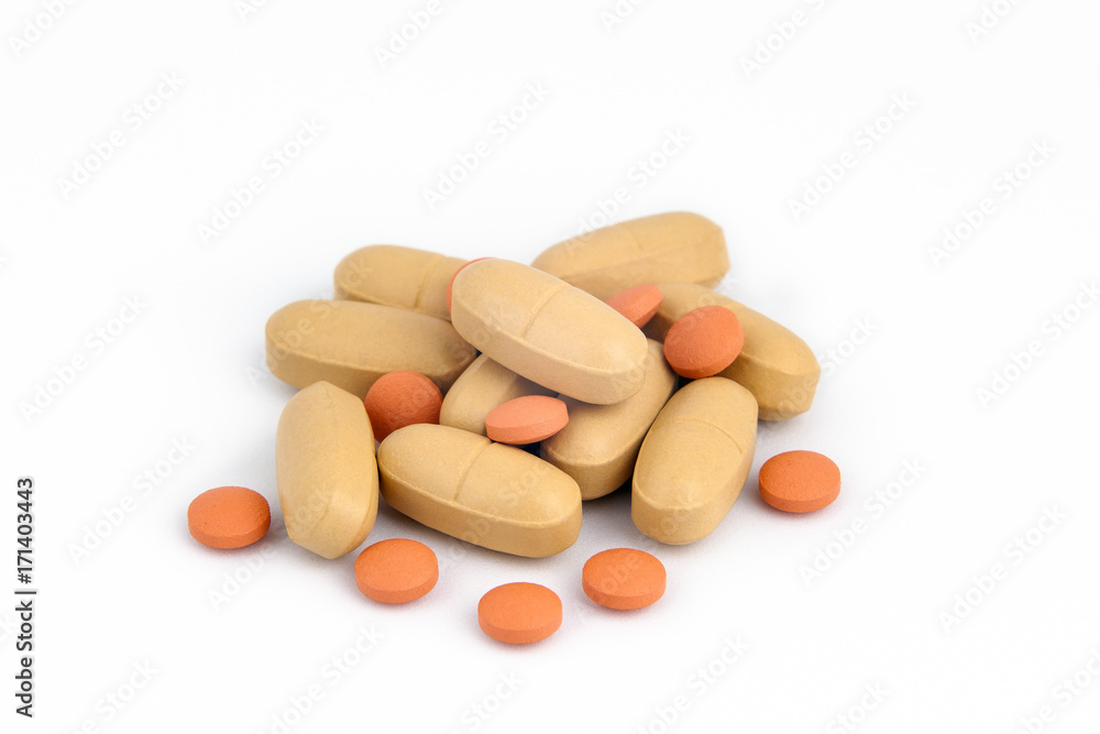 pills stacked isolated on white. Healthcare background. pills stacked isolated on white. Healthcare background.