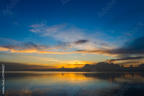 The sky and the lake in the twilight after sunset. © noppharat