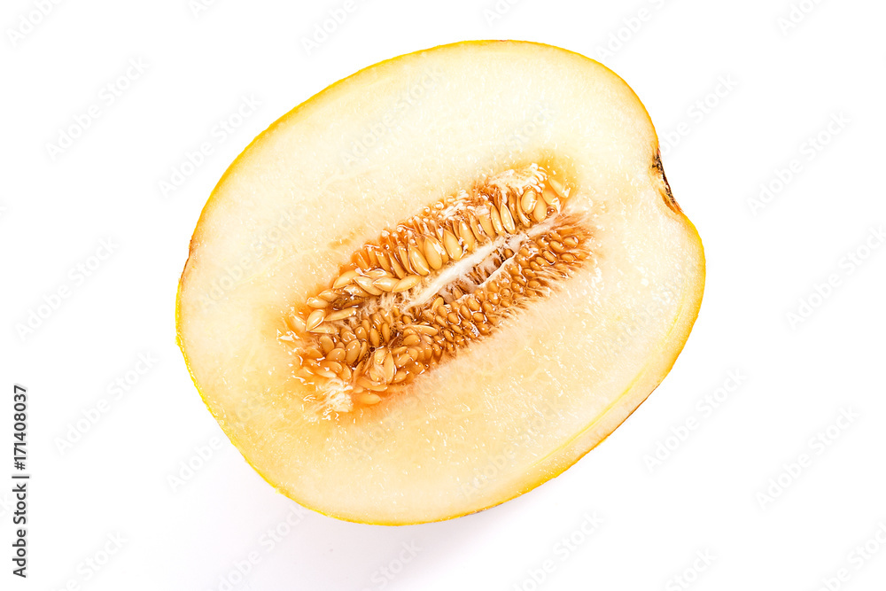 Half honeydew melon tropical fruit isolated on a white background.