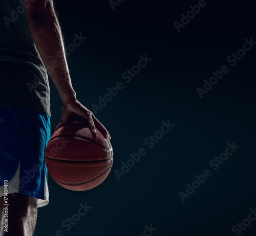 The hand of a basketball player with ball © master1305