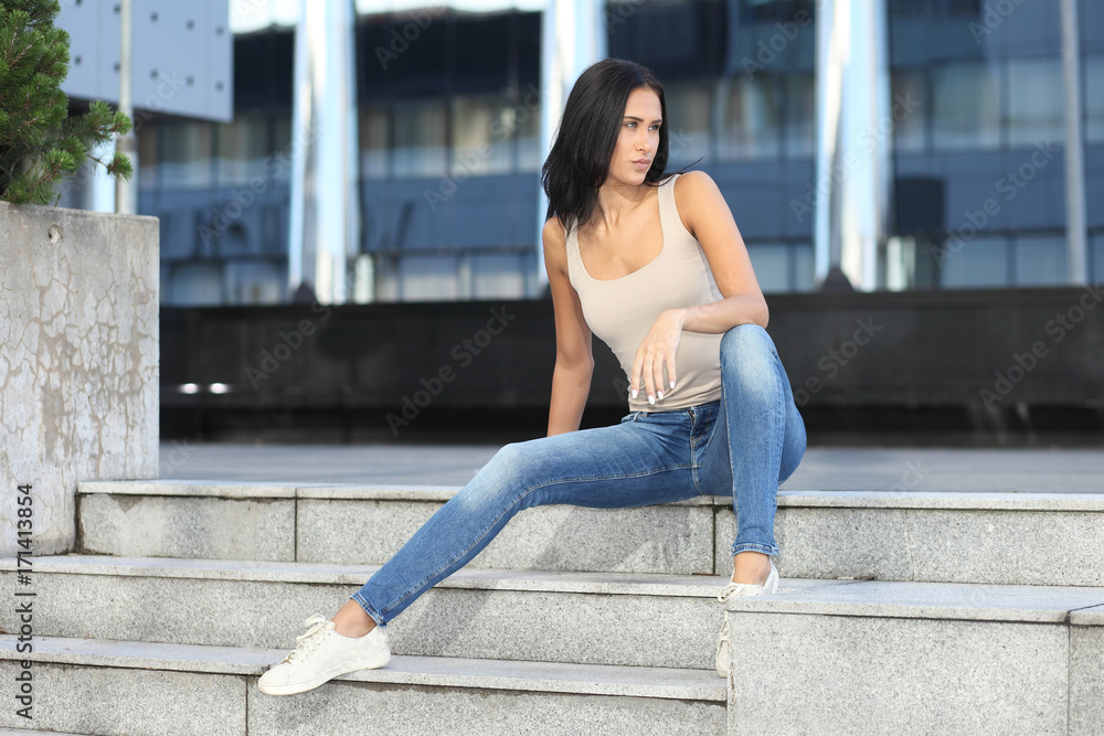 young fashionable girl in the cityscape