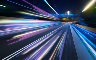 Moving forward motion blur background with light trails ,night scene .