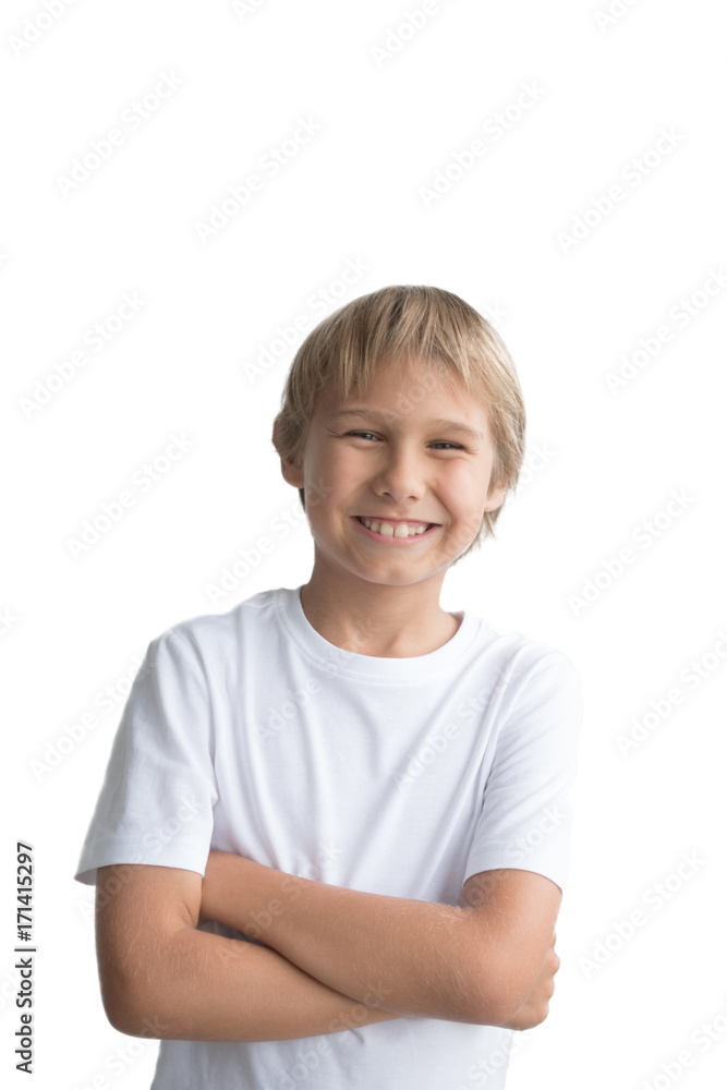 Smiling kid with crossed arms wearing white t-shirt on white background Smiling kid with crossed arms wearing white t-shirt on white background