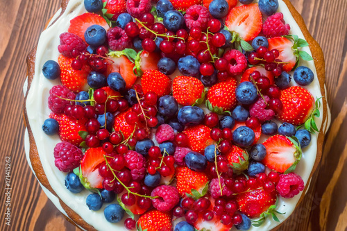 Top view delicious cake with berries