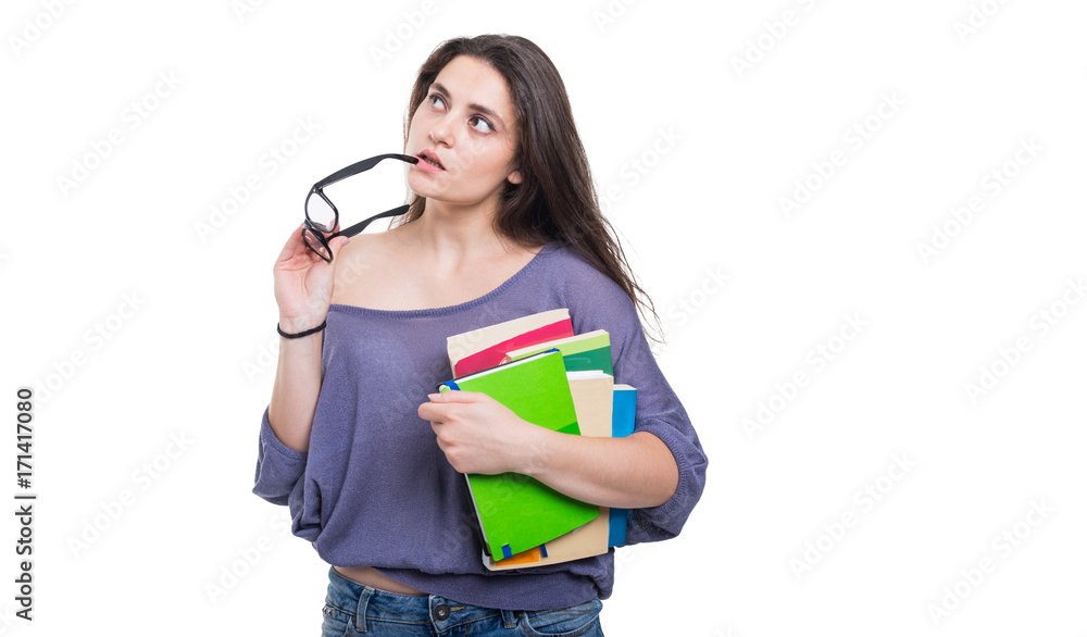 Young university student thinking and looking up Young university student thinking and looking up