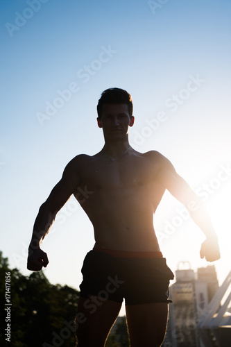 Sportsman showing muscular body