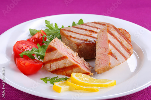 tasty grilled tuna steak with salad