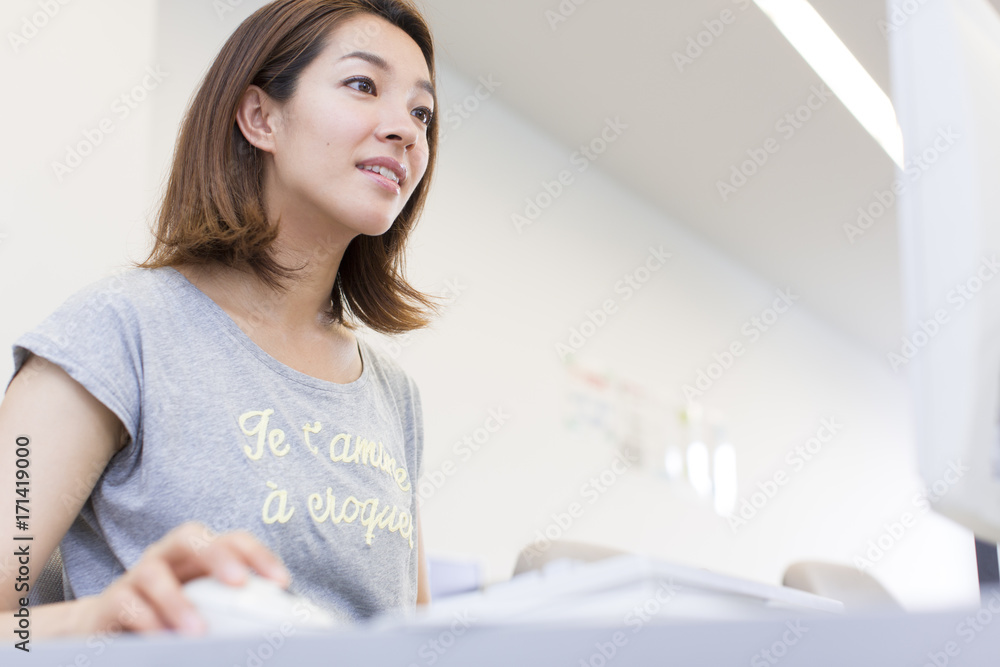 Female College Student Working in Computer Lab