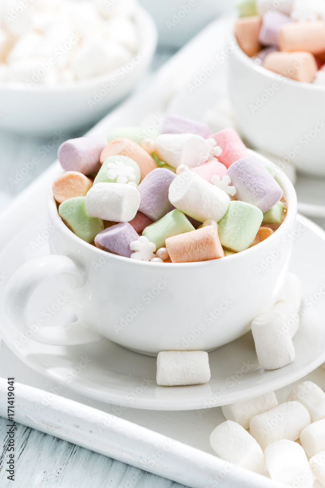 cocoa with marshmallow in white cups, vertical cocoa with marshmallow in white cups, vertical