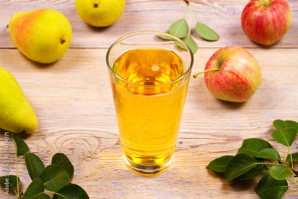 Glass of cider with apples and pears. Cider with fruits. Food and drink concept Glass of cider with apples and pears. Cider with fruits. Food and drink concept