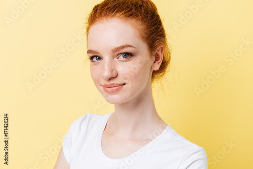 Close up picture of smiling girl looking at the camera