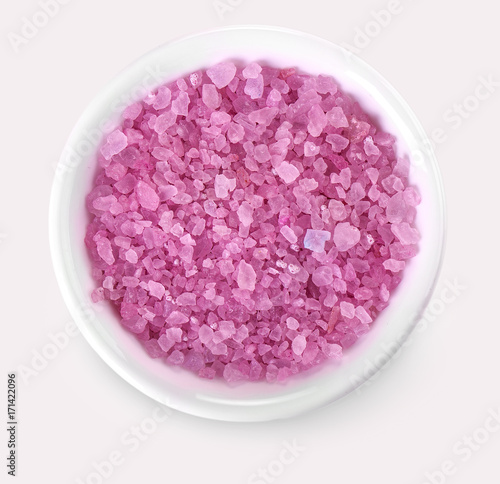 Bath salt in a white cup isolated on a white background.