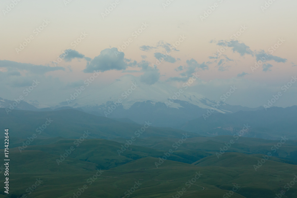 Russia, Republic of Kabardino-Balkaria, time lapse. Summer in the mountains of the Caucasus. Formation and movement of clouds over mountains peaks.