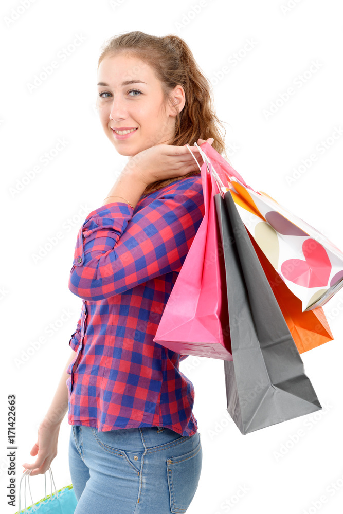 young woman with many shopping bags on white background ..