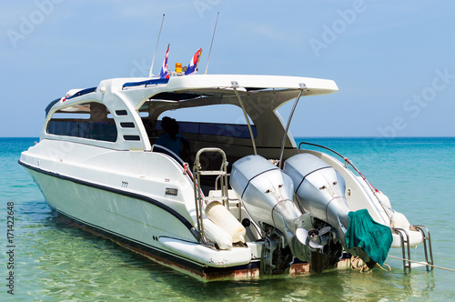 Beautiful beach with motor speed boat © rostovdriver