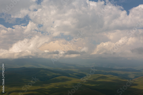 Russia, Republic of Kabardino-Balkaria, time lapse. Summer in the mountains of the Caucasus. Formation and movement of clouds over mountains peaks. © Dmitry Monastyrskiy