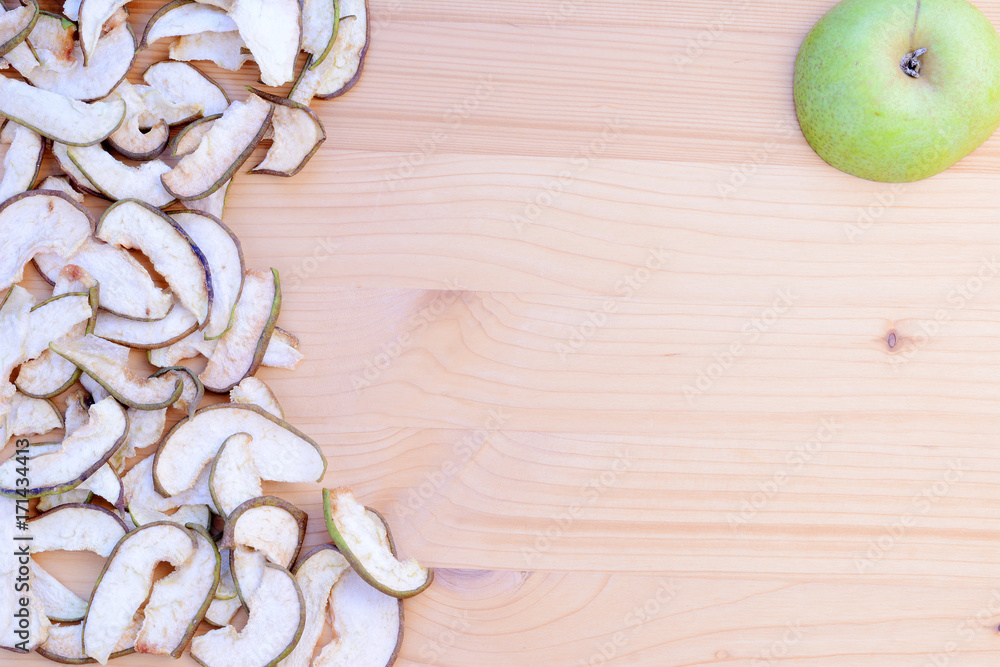Ripe organic and dried pears on a wooden table, top view. Ripe organic and dried pears on a wooden table, top view.