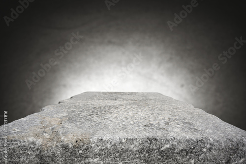 rock table background and gray dark wall space 