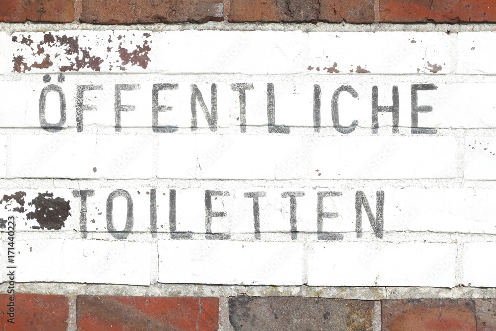 Fototapeta premium Schild Öffentliche Toiletten