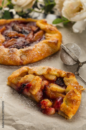 Homemade galette with plum and pears