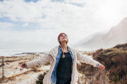 Happy woman relaxing in fresh nature #171444023