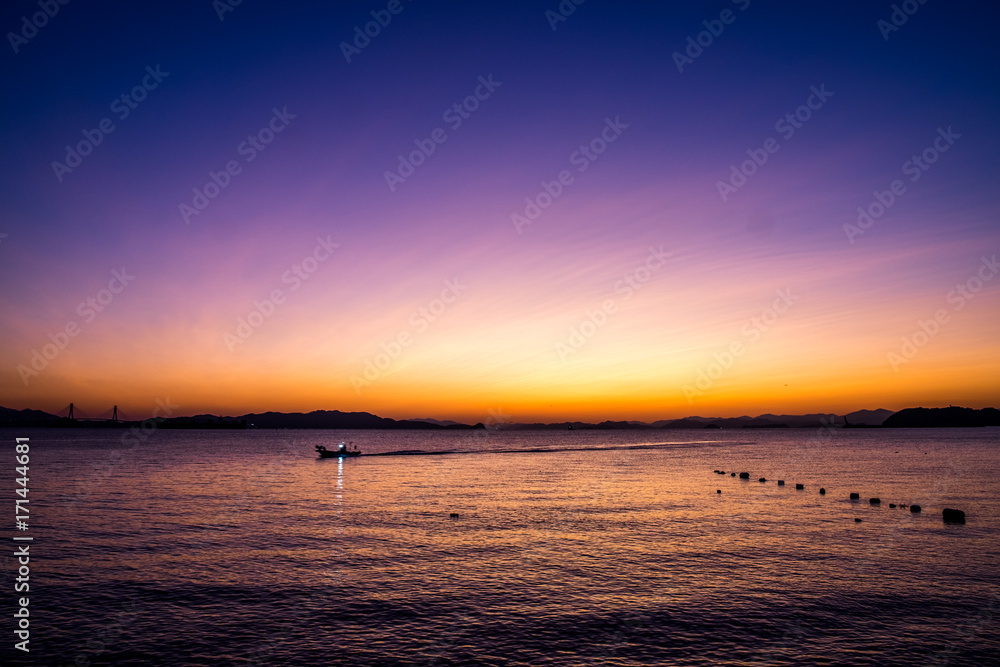 Naklejka premium Sunset from Gadeokdo-Island, Busan, South Korea