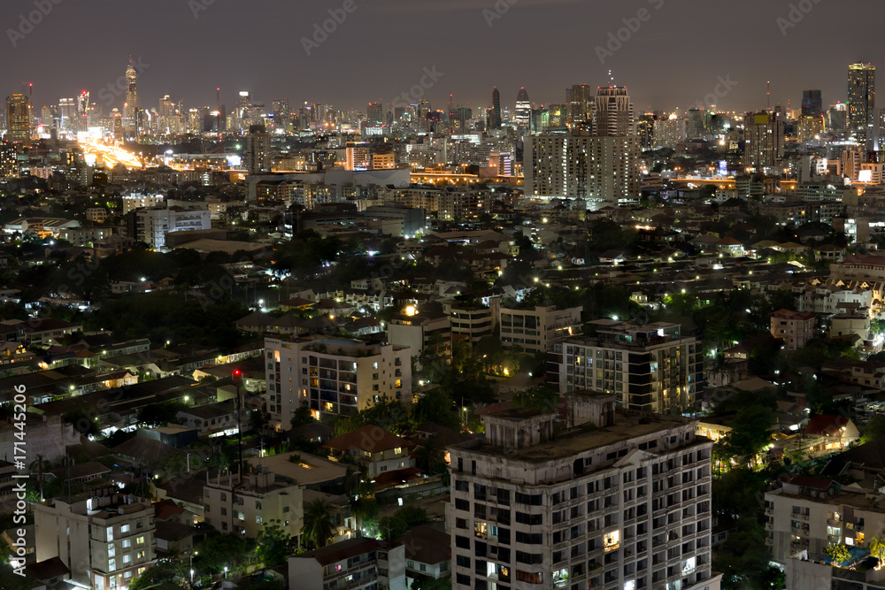 Bangkok city scrapers with high building at night time