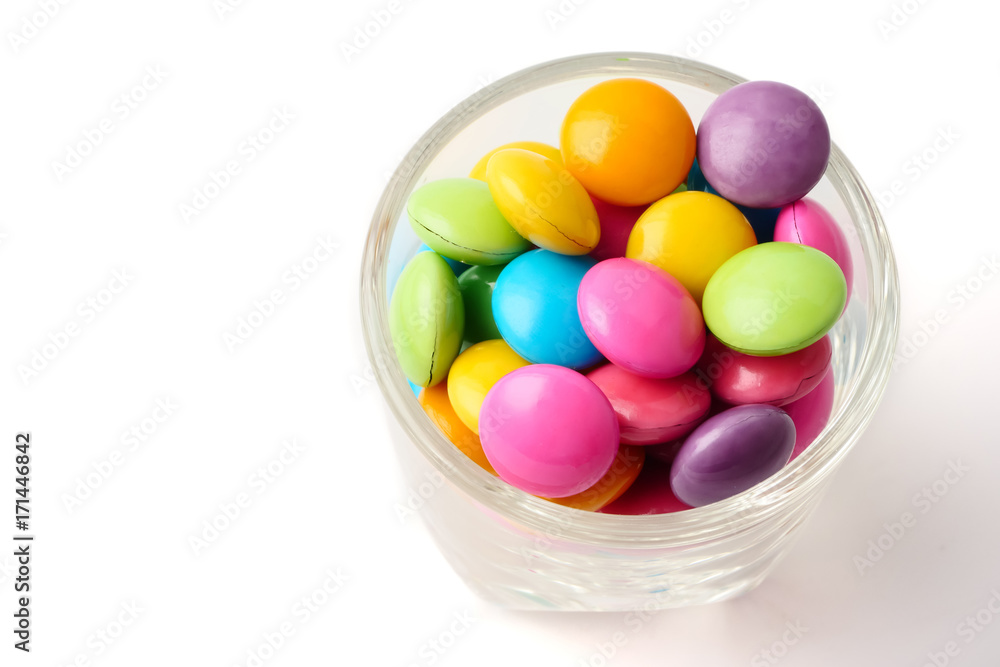 Colorful candies in glass on white background. Colorful candies in glass on white background.