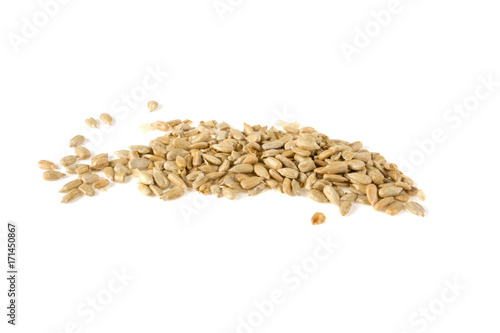 peeled sunflower seeds on white background