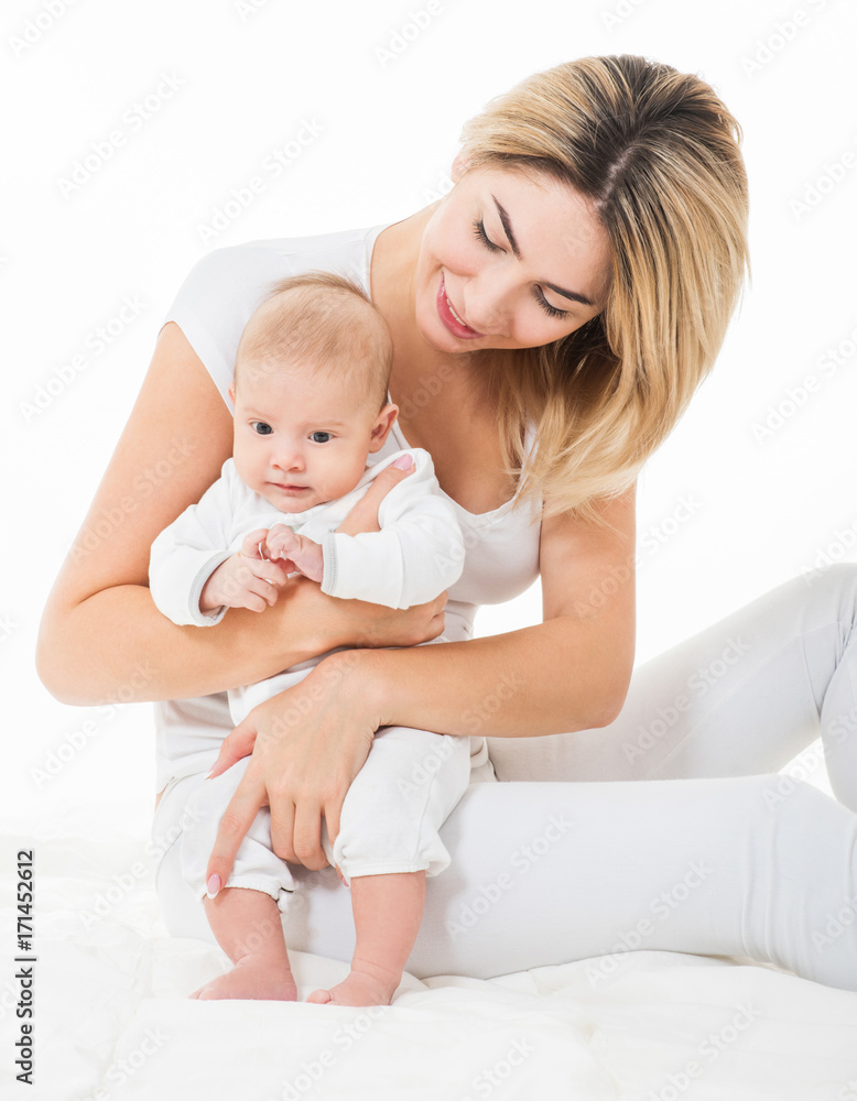 Mother and baby playing and smiling. Happy family. Isolated, Mother and baby playing and smiling. Happy family. Isolated,