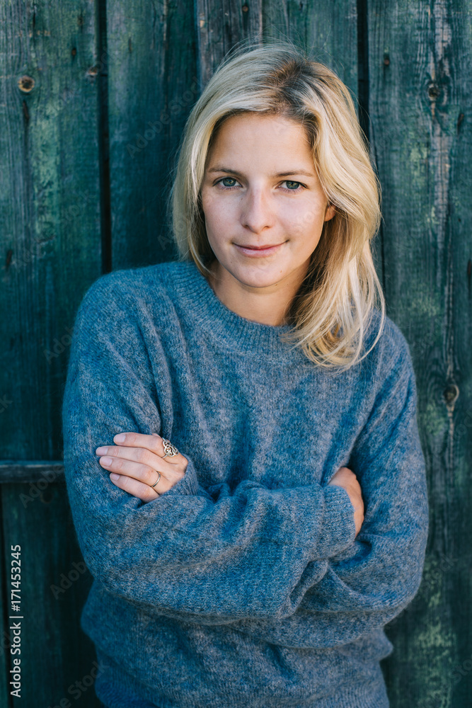 Blonde woman in warm sweater Blonde woman in warm sweater