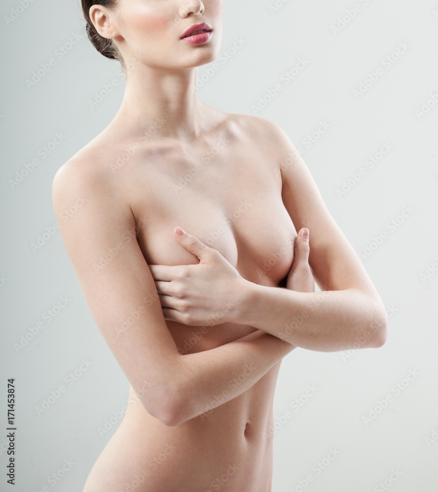 Beautiful young woman with clean skin nude topless breasts. Beautiful woman covering her nude breast. Beautiful young woman with clean skin nude topless breasts. Beautiful woman covering her nude breast.
